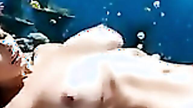 Blonde with huge tits gets drilled deep underwater with a huge cock