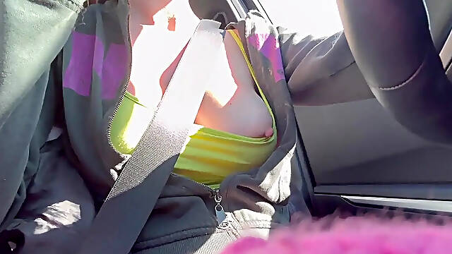 Big-titted Artemisia Love flashes her natural boobs while driving