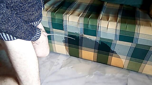 John is pissing it all on the sofa